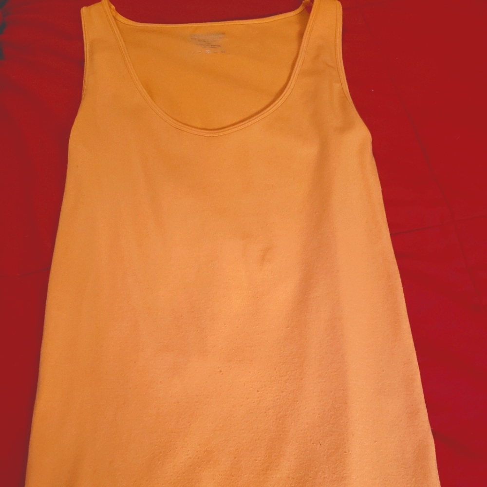 Ladies mustard colored tank top. Never worn. Excellent condition.